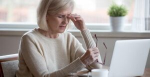 Older woman having a headache