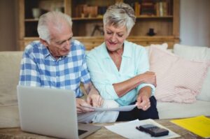 Senior couple reviewing finances