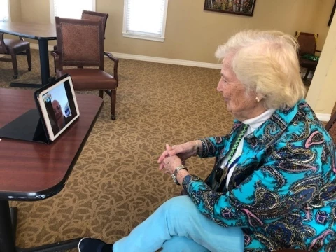 Senior woman using video chat