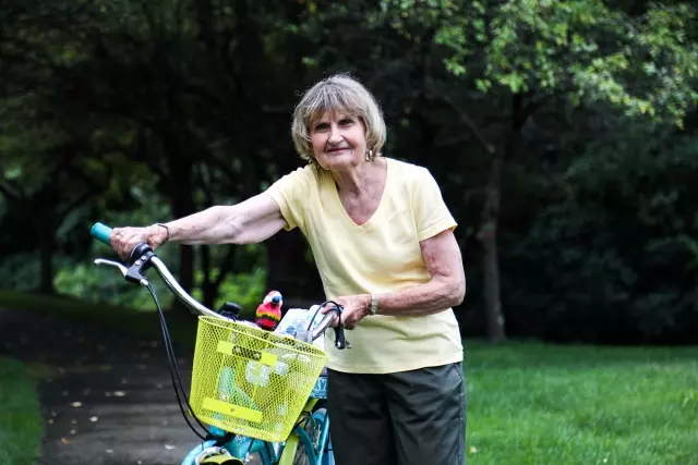 Senior woman with bicycle