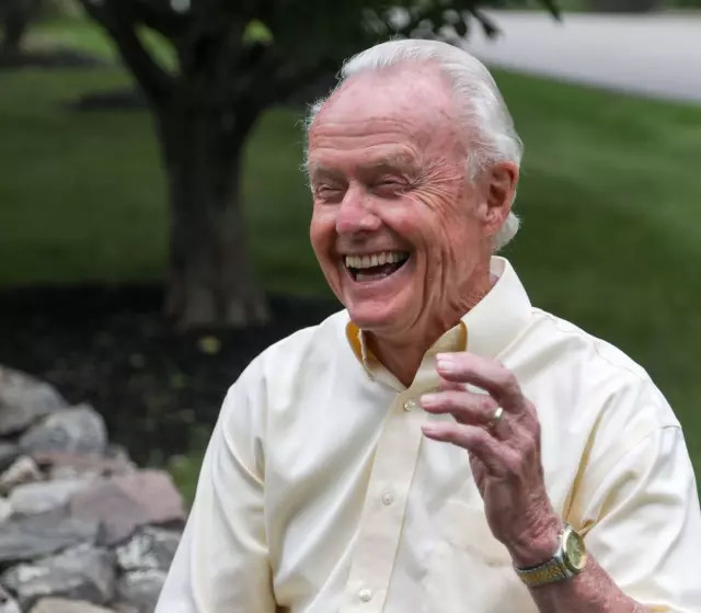 Senior man laughing outdoors