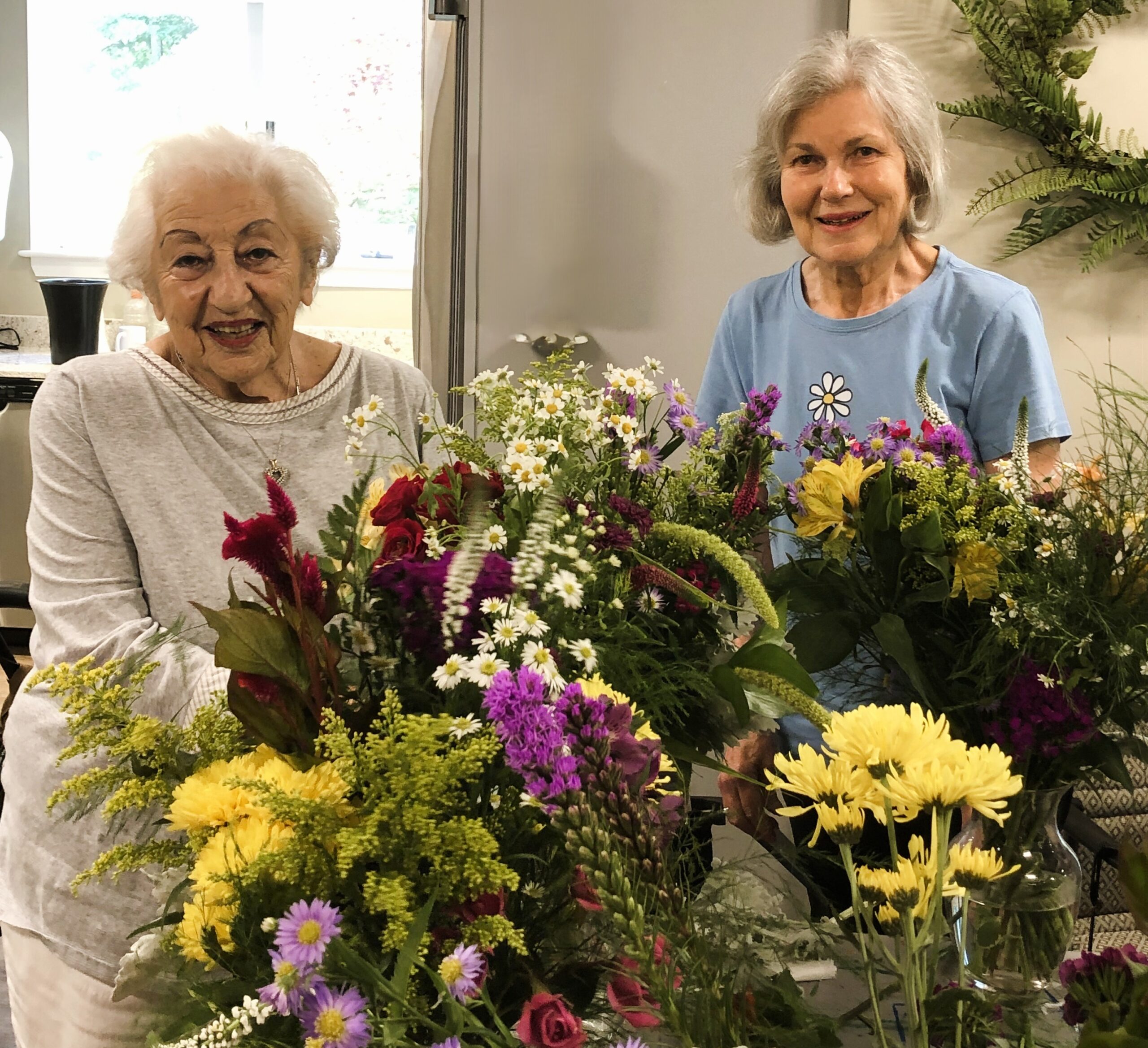 Pauline and Lloyd C. at a floral arranging class.