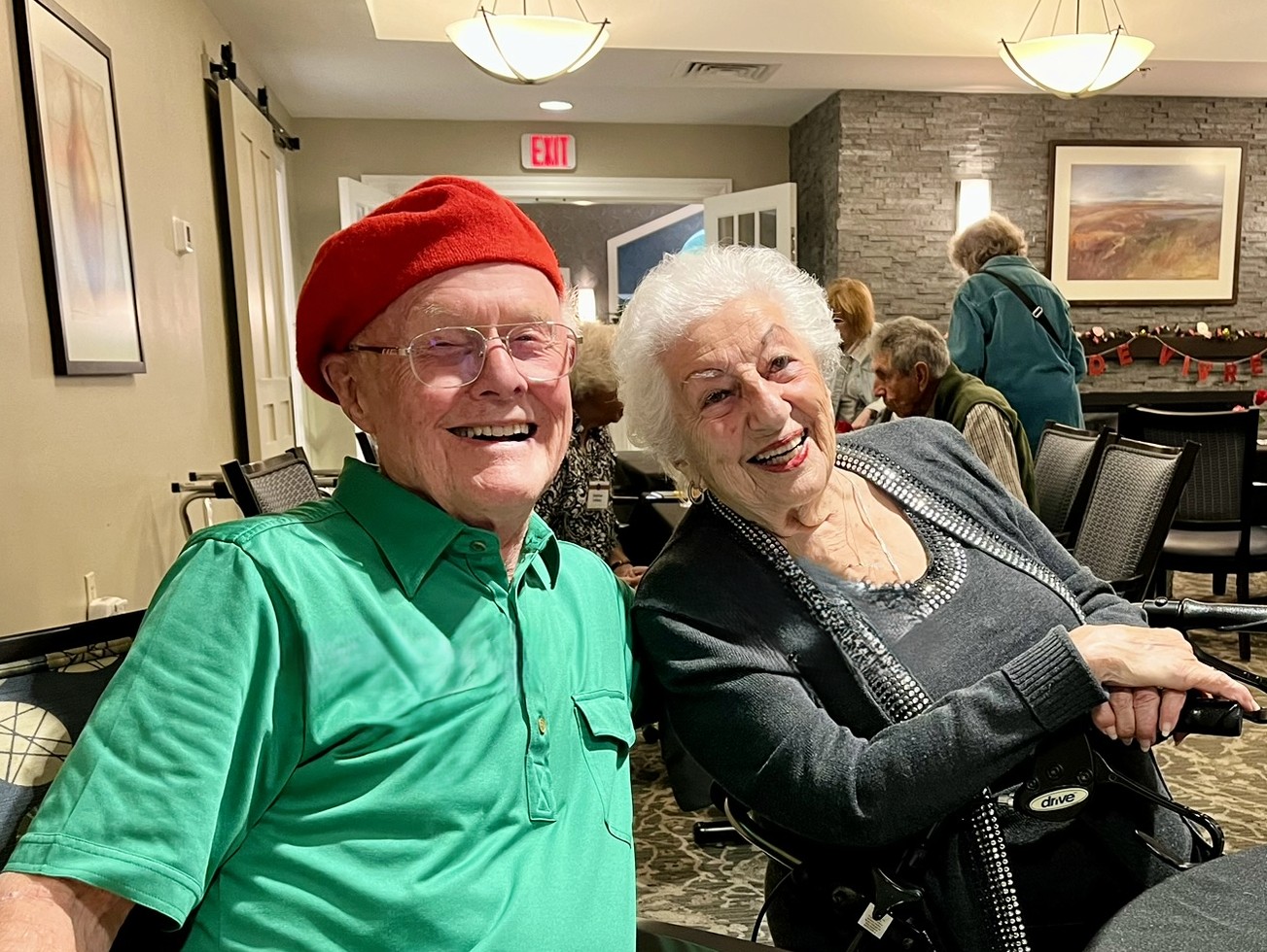 Pauline posing with friend and resident Leif E. at a New Pond party