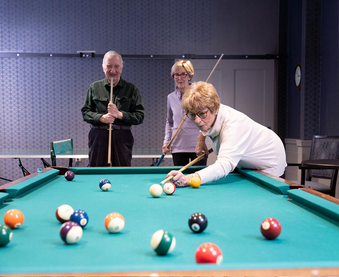 Residents playing billiards