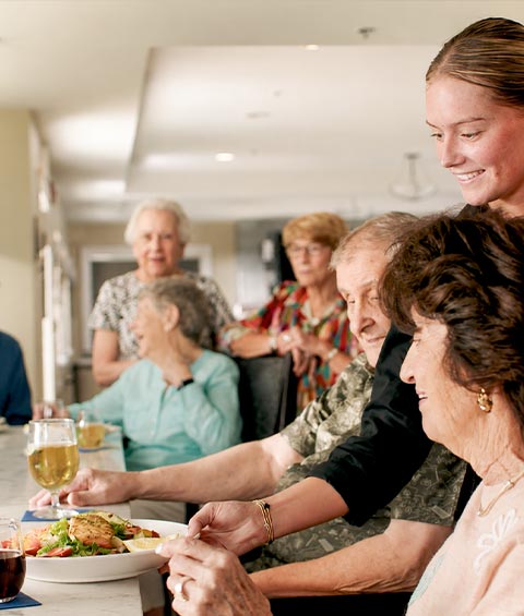 Associate serving residents food